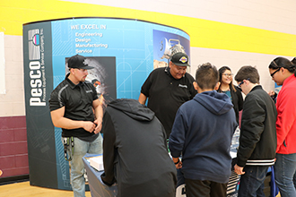 Students visiting the PESCO booth at the Career Expo lunch.